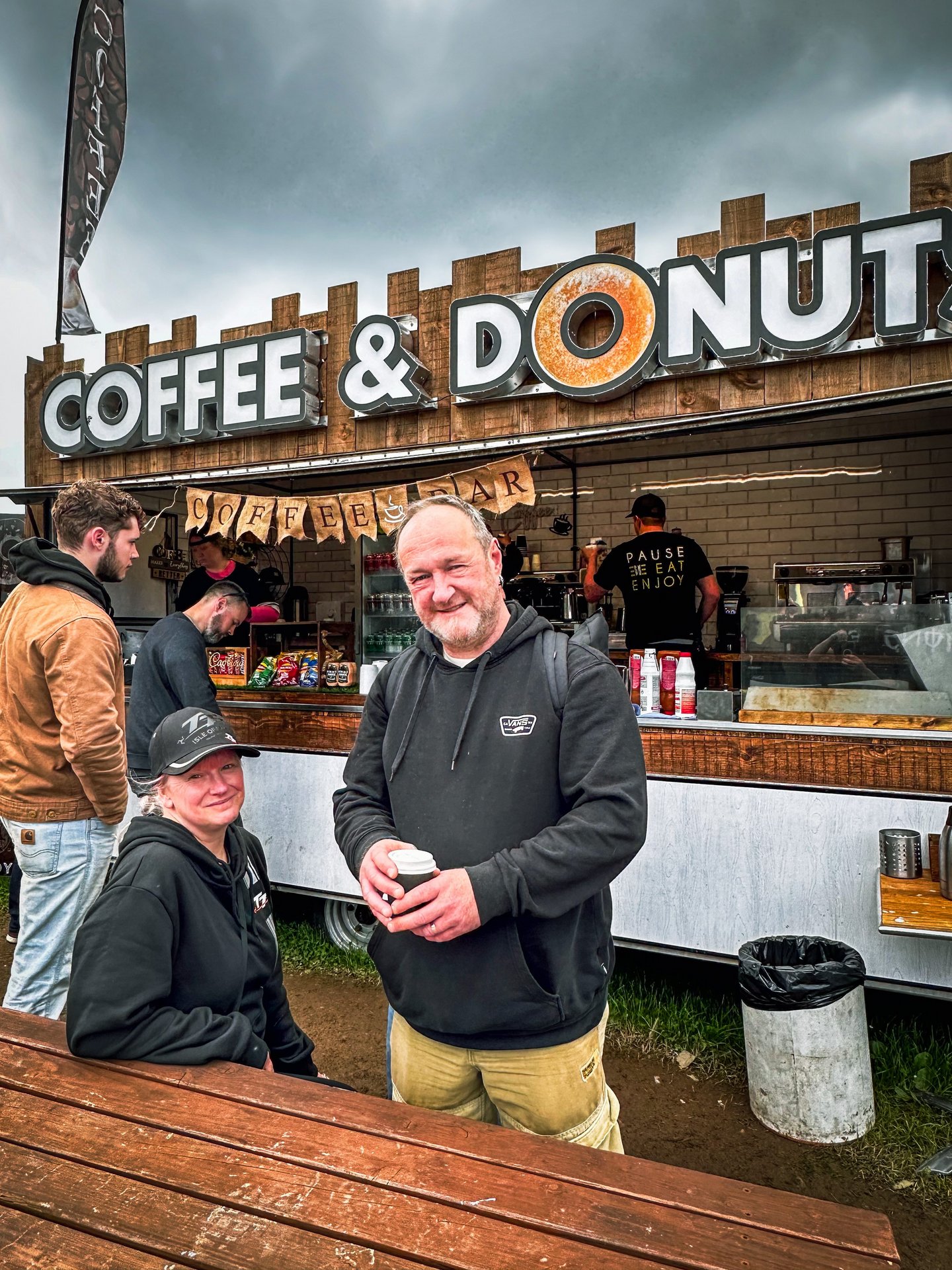 Couple enjoying Coffee &amp; Donuts - The Street Diner