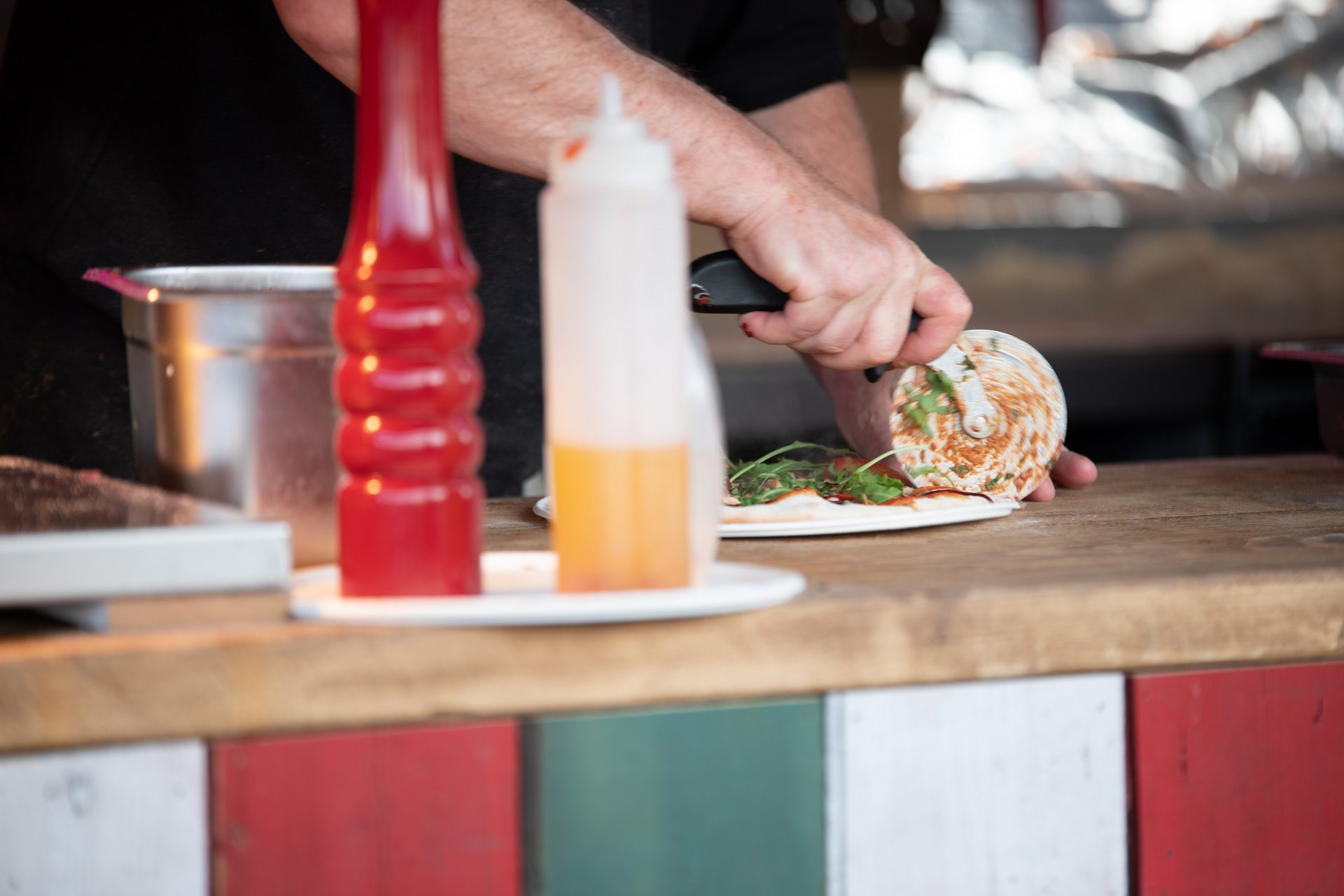 ​Mamma Mia Pizza being sliced 